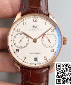 IWC Portugieser Automatic 7-Day IW500701 (ZF Factory V3) in polished 18K rose gold, featuring a classic white/silver dial, applied gold Arabic numerals, and a brown alligator leather strap.